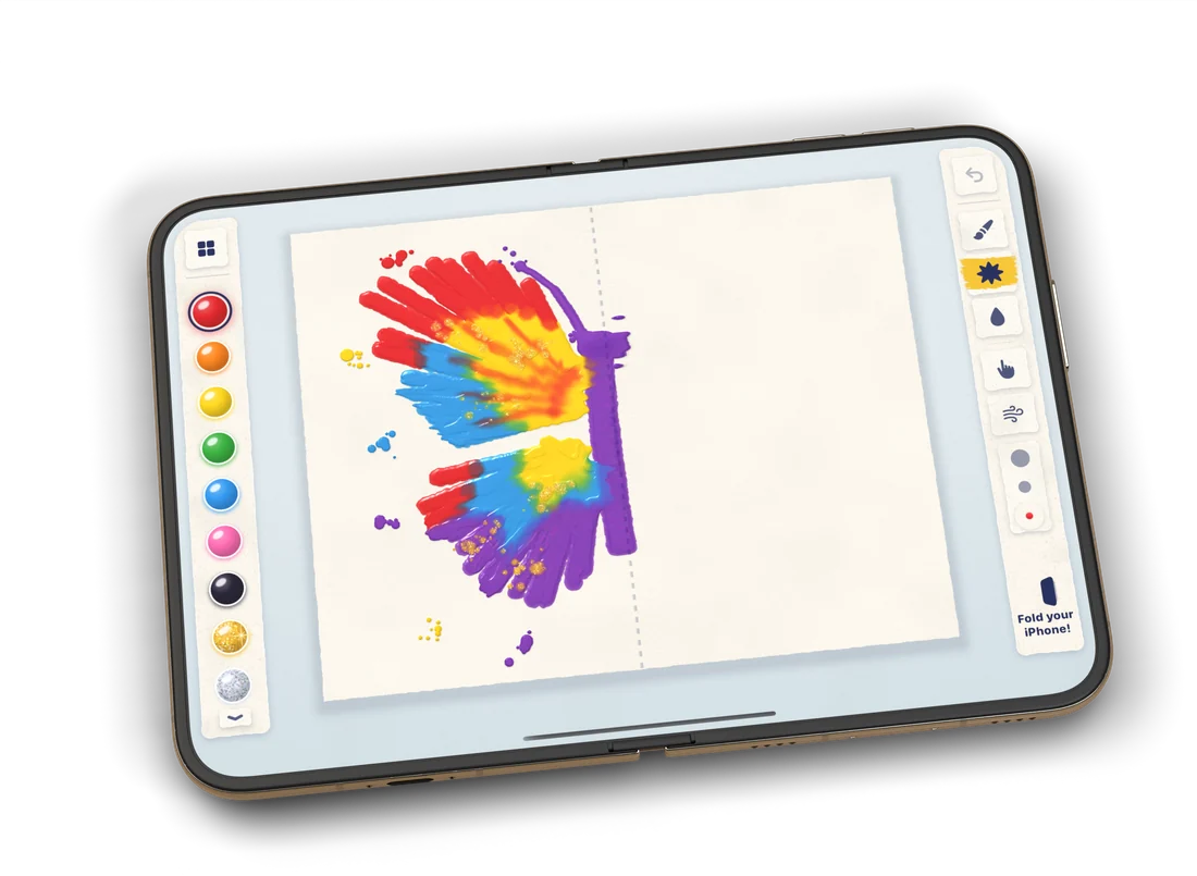 An open iPhone Duo with paint splats and brush strokes on one half of the page.