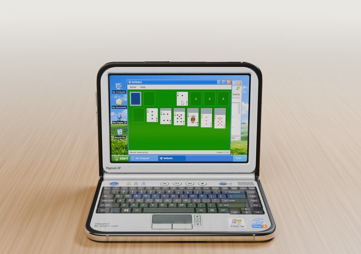 Solitaire on the Windows XP-style laptop
